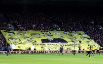 <p>A huge Graham Taylor banner is unfurled at Vicarage Road</p>