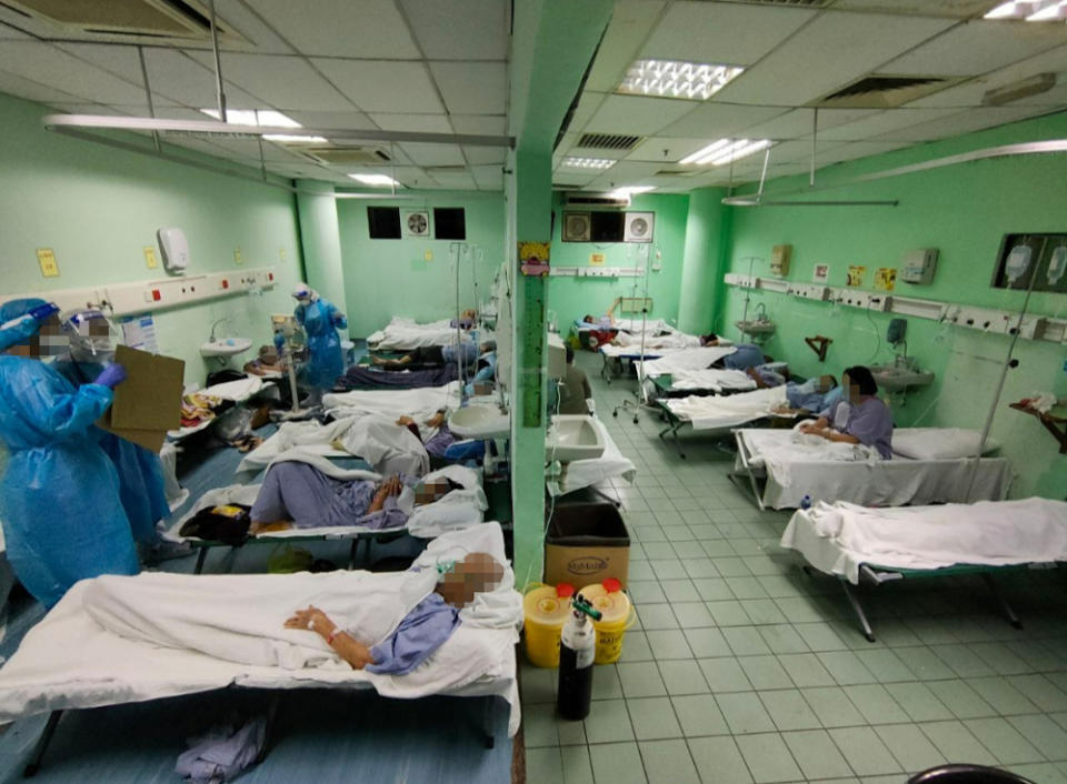 Instead of proper hospital beds, these patients are sleeping on makeshift cots.