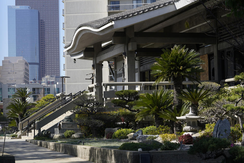 This photo shows the front entrance of the Higashi Honganji Buddhist Temple that was vandalized in Los Angeles Saturday, Feb. 27, 2021. Authorities are investigating the vandalism and fire at the Buddhist temple in the Little Tokyo section of downtown Los Angeles. The incident Thursday night occurred as hate crimes against Asian Americans are increasing nationwide. However, police said it was too early to label Thursday night's vandalism at the Higashi Honganji Buddhist Temple a hate crime. (AP Photo/Damian Dovarganes)