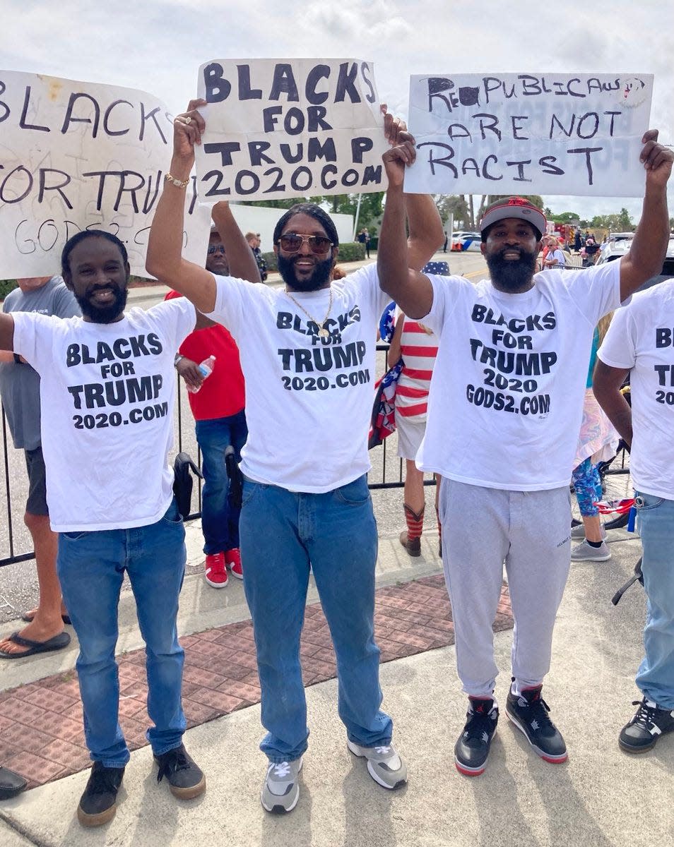 Michael Symonette (center), of Miami, arrived at about 11 a.m. in a Rolls Royce SUV. Wearing a “Blacks for Trump” T-shirt, he criticized special counsel Jack Smith, former President Barack Obama, President Joe Biden and others. “I’m not scared to talk about them because they are the devil.”