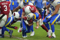 Arizona Cardinals defensive end J.J. Watt (99) sacks Los Angeles Rams quarterback Matthew Stafford (9) during the second half of an NFL football game, Sunday, Sept. 25, 2022, in Glendale, Ariz. (AP Photo/Rick Scuteri)