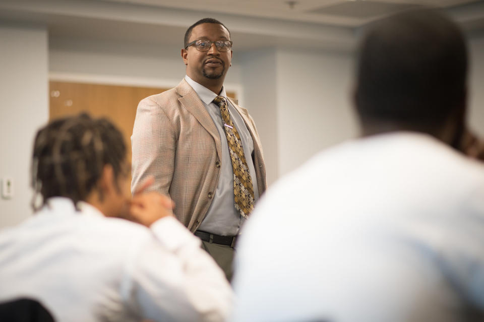 Tallis Brown of Urban League of St. Louis facilitates during a 'Save Our Sons' course.