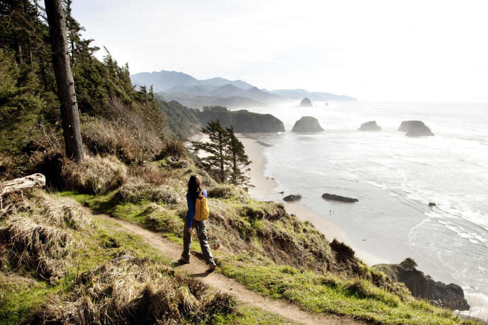 A hiker in Ecola State Park, Oregon