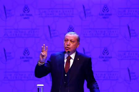 Turkish President Tayyip Erdogan makes a speech during a meeting in Istanbul, Turkey, March 19, 2017. REUTERS/Murad Sezer