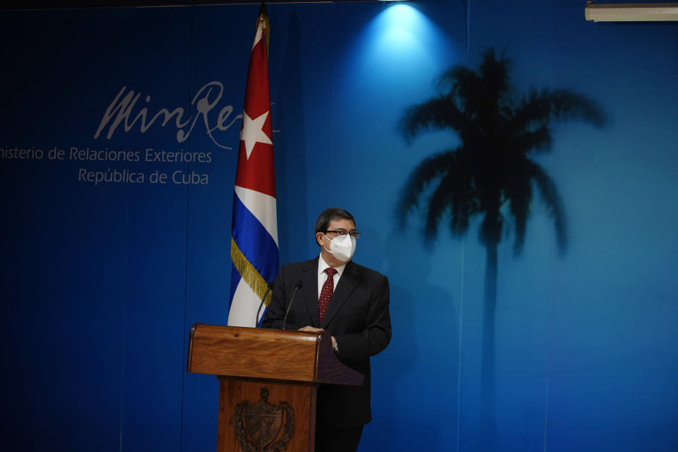 Cuban Foreign Minister Bruno Rodríguez Parrilla, wearing a mask amid the COVID-19 pandemic, presents Cuba's report on the impact of the US embargo policy on the island over the past year, at the Foreign Affairs Ministry in Havana, Cuba, Thursday, Oct. 22, 2020. (AP Photo/Ramon Espinosa)