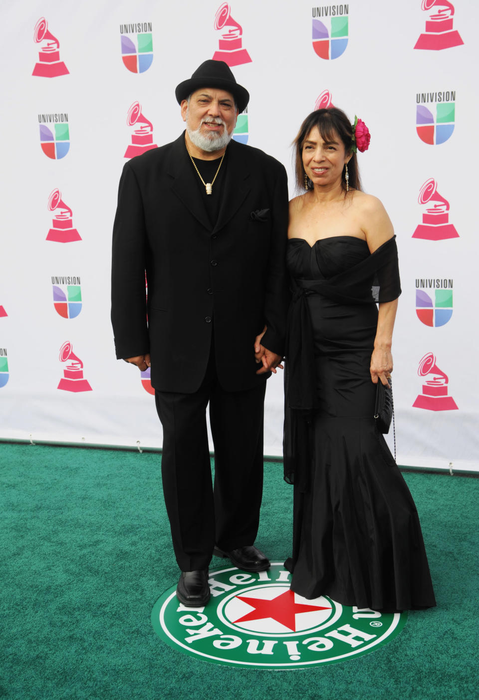 Poncho Sanchez, left, and Stella Sanchez arrive at the 13th Annual Latin Grammy Awards at Mandalay Bay on Thursday, Nov. 15, 2012, in Las Vegas. (Photo by Brenton Ho/Powers Imagery/Invision/AP)