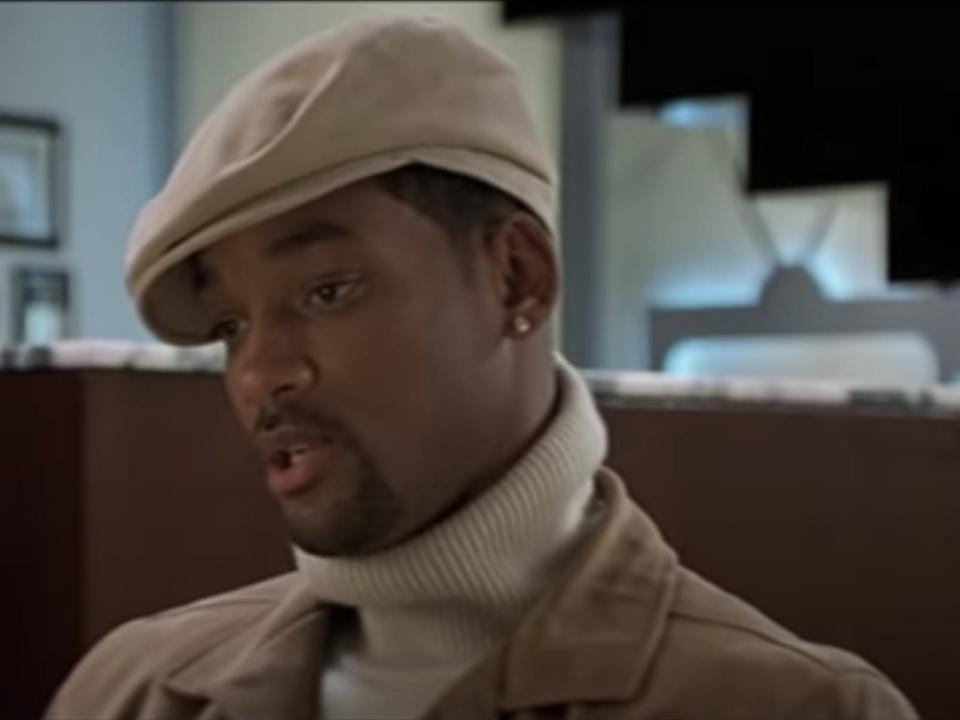 Will Smith in a beige coat, turtleneck, and hat in "Jersey Girl"