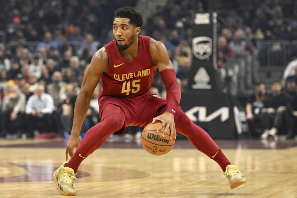 Cleveland Cavaliers guard Donovan Mitchell drives during the first half of an NBA basketball game against the Atlanta Hawks, Monday, Nov. 21, 2022, in Cleveland. (AP Photo/Nick Cammett)