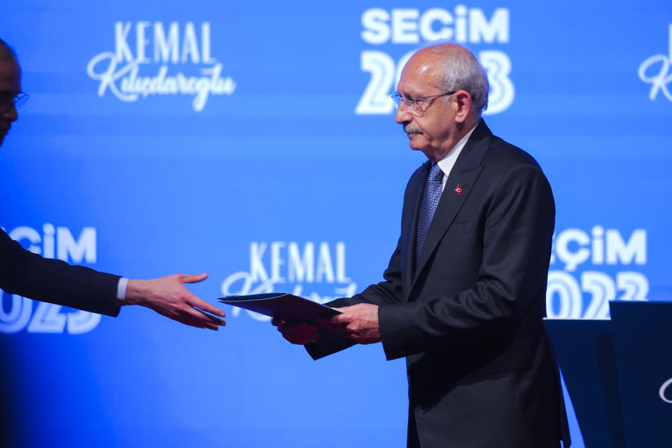 Kemal Kilicdaroglu, the 74-year-old leader of the center-left, pro-secular Republican People's Party (CHP), leaves the stage after speaking at the party's headquarters in Ankara, Turkey, on Sunday, May 14, 2023. More than 64 million people, including 3.4 million overseas voters, were eligible to vote. (AP Photo)