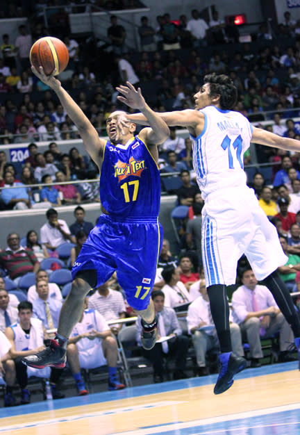 TNT's Jayson Castro is fouled by San Mig Coffee's Alex Mallari. (Nuki Sabio/PBA Images)