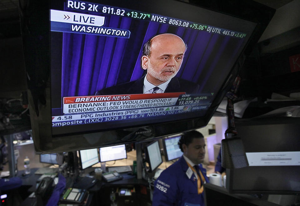 Federal Reserve Chairman Ben Bernanke is broadcast on a television screen on the trading floor of the New York Stock Exchange, Wednesday, April 25, 2012. Bernanke says further bond purchases by the Fed remain "very much on the table" if the economy needs further support. (AP Photo/Richard Drew)