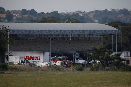 Trucks are seen at a warehouse, where international humanitarian aid for Venezuela will be stored according to authorities, near the Tienditas cross-border bridge between Colombia and Venezuela, in Cucuta, Colombia February 7, 2019. REUTERS/Marco Bello