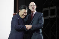 NBA Commissioner Adam Silver, right, and Rakuten, Inc. Chairman & CEO Mickey Mikitani greet each other during a welcome reception for the NBA Japan Games 2019 between the Toronto Raptors and the Houston Rockets in Tokyo, Monday, Oct. 7, 2019. (AP Photo/Kiichiro Sato)