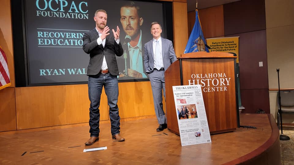 Superintendent Ryan Walters spoke to the Oklahoma Conservative Political Action Committee in August. Wade Burleson (right), a member of the state education department’s faith committee, is chair of the PAC. (Courtesy of Wade Burleson)