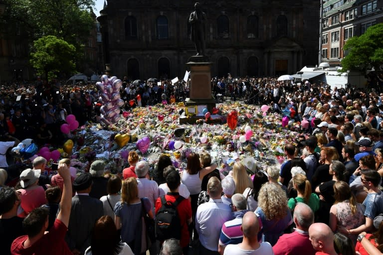 The crowd broke out into spontaneous song after the minute's silence