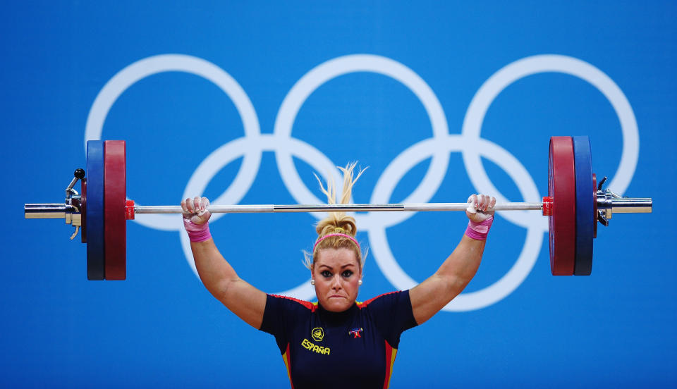 LONDON, ENGLAND - AUGUST 03: Lidia Valentin Perez of Spain competes in the Women's 75kg Weightlifting Final on Day 7 of the London 2012 Olympic Games at ExCeL on August 3, 2012 in London, England. (Photo by Laurence Griffiths/Getty Images)