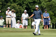 Hideki Matsuyama, of Japan, reacts after putting on the 18th hole during the first round of the AT&T Byron Nelson golf tournament in McKinney, Texas, on Thursday, May 12, 2022. (AP Photo/Emil Lippe)