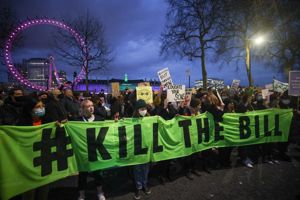 Protesters with the message 'Kill The Bill' outside New Scotland Yard on Monday evening.