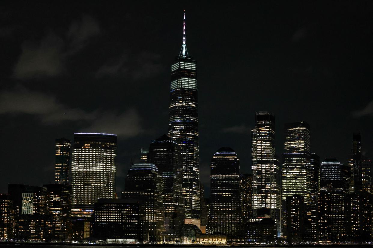 Night view of New York city's lower Manhattan skyline, with the One World Trade Center skyscraper (center left), seen from Jersey City on Jan. 20, 2024. New York City ranks as the No. 1 noisiest U.S. cities.