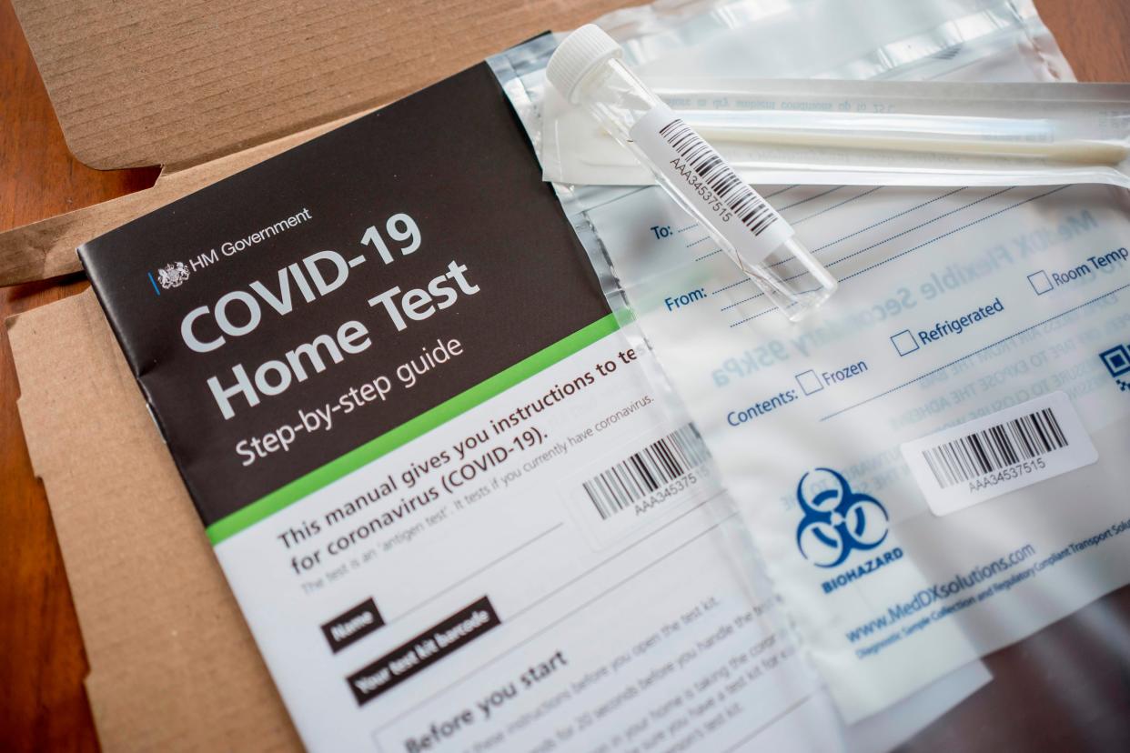 The contents of a UK Government Covid-19 antigen home test kit, which determines whether you are currently infected with the novel coronavirus (AFP via Getty Images)