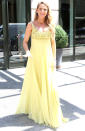 <p>This lemon yellow Jenny Packham gown skimmed over the star’s baby bump beautifully and was enhanced with a pair of Jennifer Meyer statement earrings. <i>[Photo: Rex]</i></p>