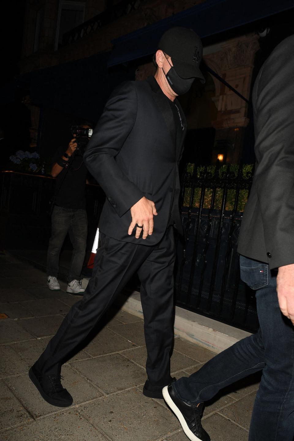 DiCaprio was pictured in all black going to the event (Raw Image LTD/MEGA)