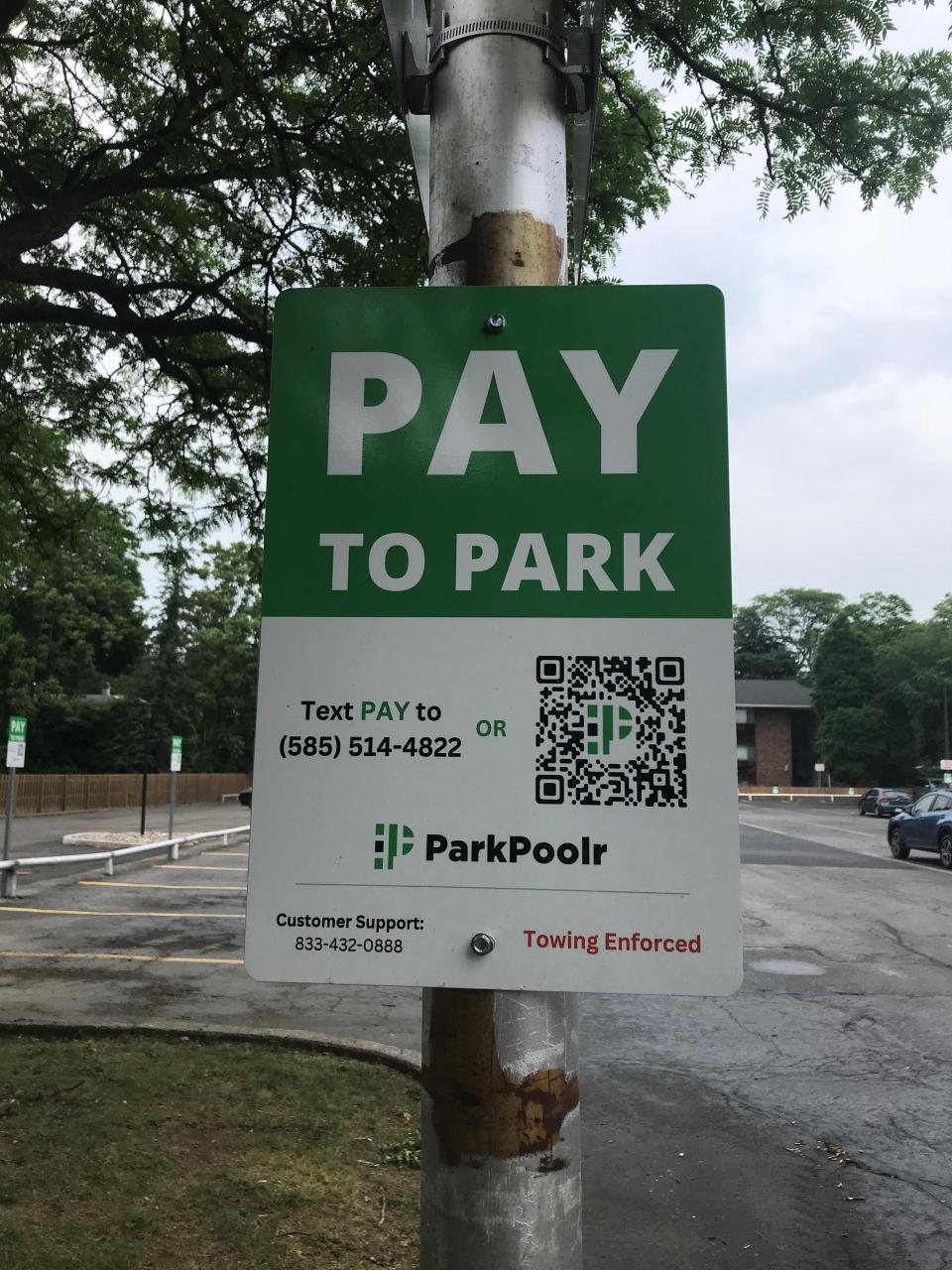 Patrons are asked to scan the QR code to pay to park at 616 Park Ave. in Rochester. Rates start at $2 per hour.