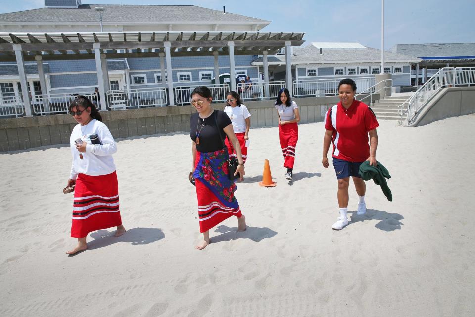 Lakota women from South Dakota are happy to work at Hampton Beach this summer. From left Tayah Running Hawk,  Kimimila Pretty Bear, Enola Running Hawk, Siouxtera Jack and Ashton Green.