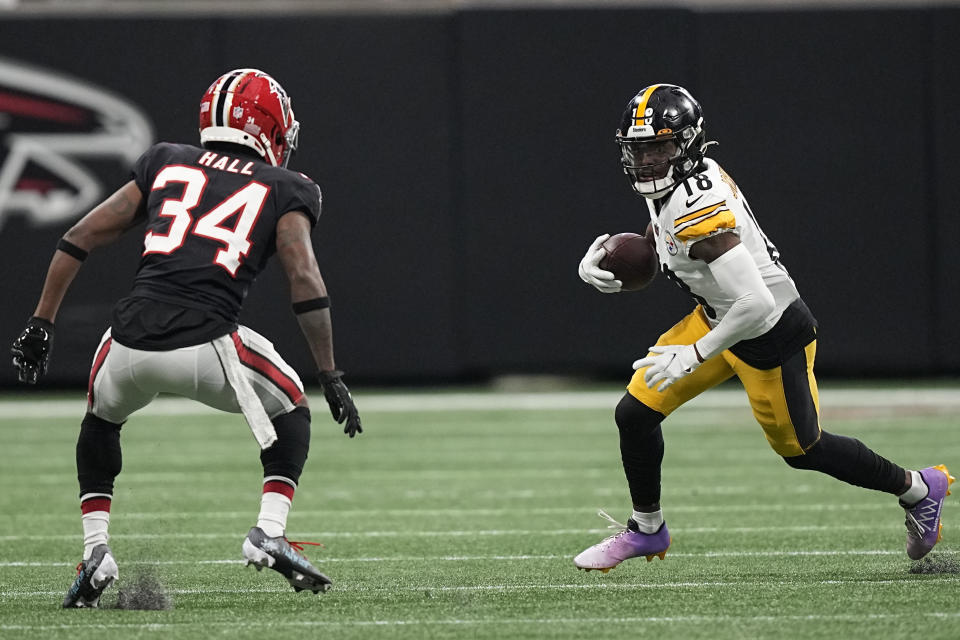 Pittsburgh Steelers wide receiver Diontae Johnson (18) runs against Atlanta Falcons cornerback Darren Hall (34) during the first half of an NFL football game, Sunday, Dec. 4, 2022, in Atlanta. (AP Photo/Brynn Anderson)