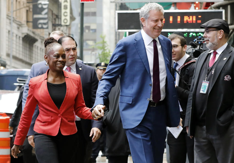 New York Mayor Bill de Blasio and his wife Chirlane McCray arrive at "Good Morning America" in New York, Thursday, May 16, 2019. De Blasio announced Thursday that he will seek the Democratic nomination for president, adding his name to an already long list of candidates itching for a chance to take on Donald Trump. (AP Photo/Richard Drew)