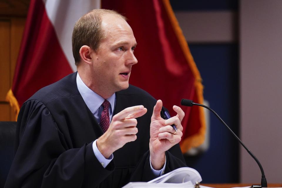 Judge Scott McAfee speaks during a hearing in Superior Court of Fulton County as part of the Georgia election indictments on Friday, Dec. 1, 2023 in Atlanta. (John David Mercer/USA Today via AP, Pool)