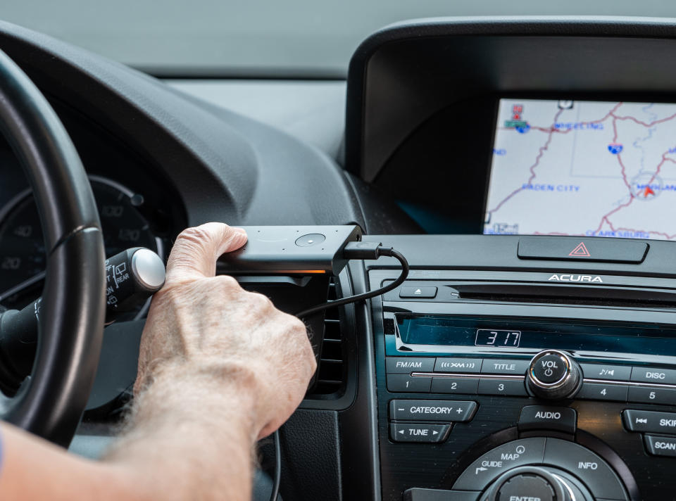 Morgantown, WV - 2 January 2020: Amazon Echo Auto smart voice operated device installed in a car to provide Alexa services