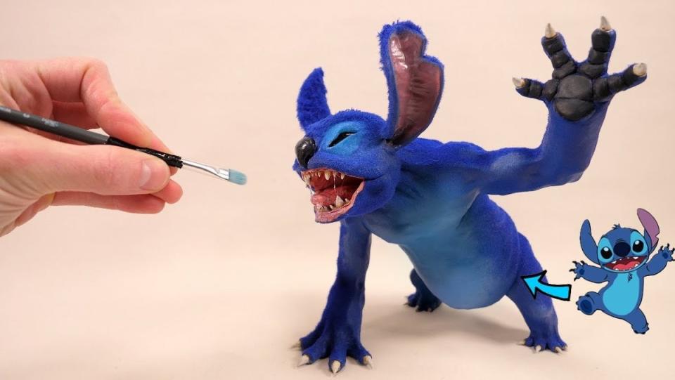 A hand with a paintbrush next to a creepy sculpture of Stitch compared to his cartoon version