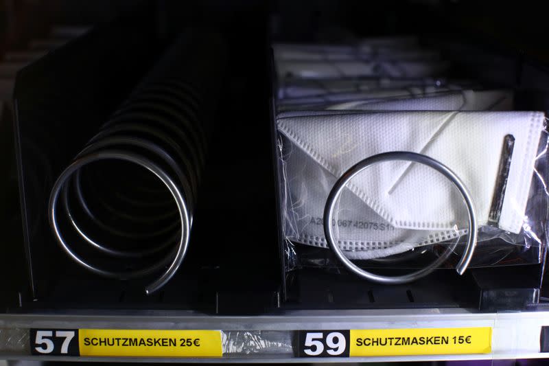 Protective masks for a price of 15 Euros each are on display inside a vending machine in an underground station during the global coronavirus disease (COVID-19) outbreak in Vienna