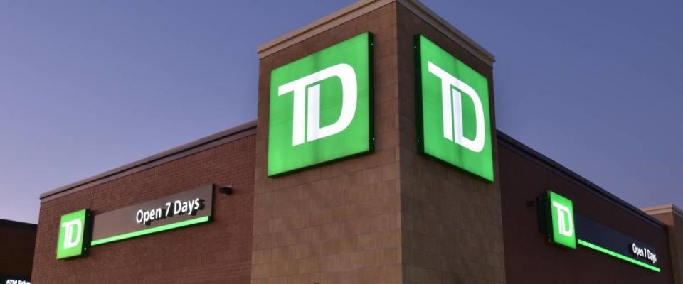 View of TD bank location from outside at night.