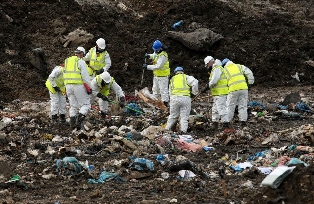 Police searching the landfill site in Milton, Cambridgeshire (PA)