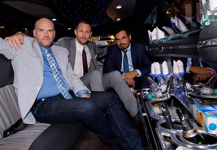 John Michael McDonagh, alongside Alexander Skarsgård and Michael Peña during the film's premiere crawl across London - Credit: Icon