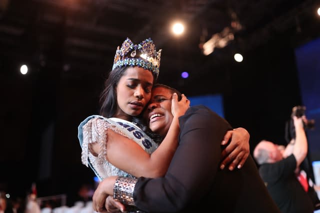 Toni-Ann Singh embraces her mother Jahrine Bailey 