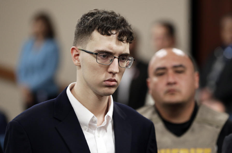 In this Oct., 10, 2019, file photo, El Paso Walmart mass shooter Patrick Crusius is arraigned in the 409th state District Court in El Paso, Texas, with Judge Sam Medrano presiding. (Mark Lambie/The El Paso Times via AP)