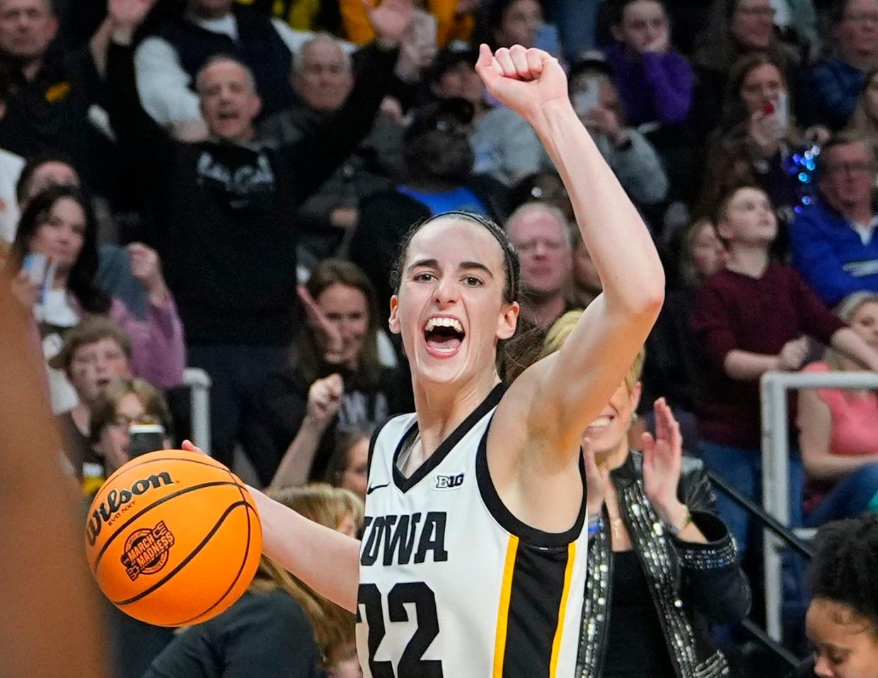 Apr 1, 2024; Albany, NY, USA; Iowa Hawkeyes guard Caitlin Clark (22) celebrates after defeating the LSU Lady Tigers in the finals of the Albany Regional in the 2024 NCAA Tournament at MVP Arena. Mandatory Credit: Gregory Fisher-USA TODAY Sports