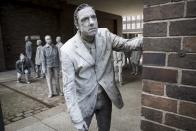 <p>Performance artists take part in a ‘1000 Gestalten’ – Zombie Walk – in Hamburg to protest the G20 summit (Rex features) </p>