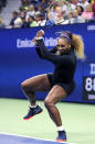 Serena Williams returns to Maria Sharapova during the first round of the U.S. Open tennis tournament in New York, Monday, Aug. 26, 2019. (AP Photo/Charles Krupa)