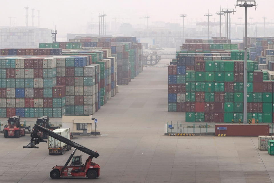 Stacks of containers are seen at the Yangshan Deep Water Port in Shanghai, China January 13, 2022. Picture taken January 13, 2022. REUTERS/Aly Song