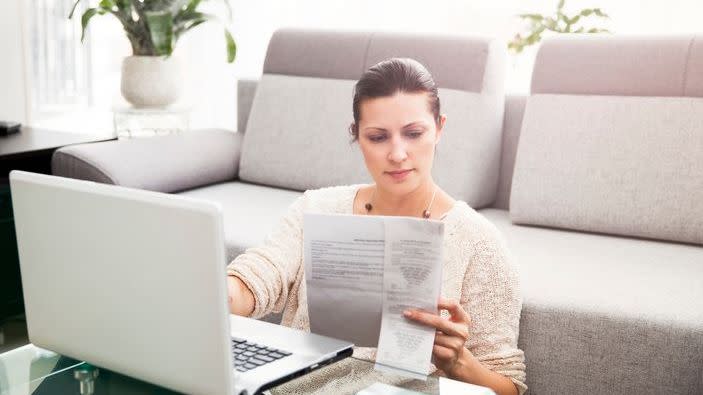 A woman sets up her tax payment plan online. 