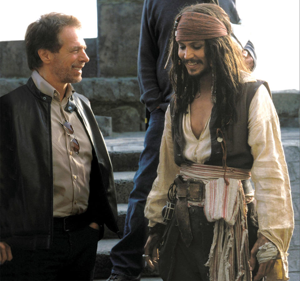 Bruckheimer with Pirates of the Caribbean’s Johnny Depp right.