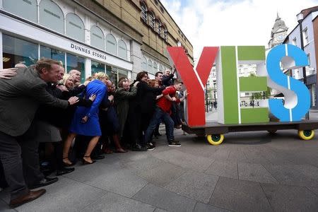 Yes campaigners take part in a photocall in central Dublin in Ireland May 21, 2015. REUTERS/Cathal McNaughton