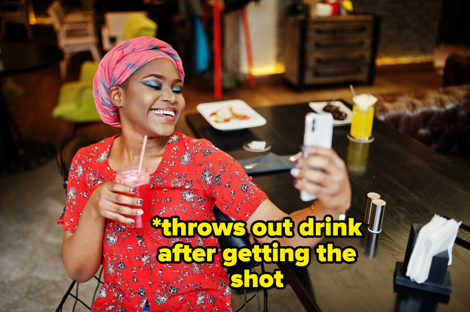 person taking a selfie with their drink with text reading, throws out drink after getting the shot