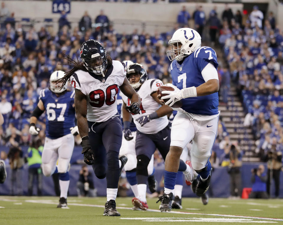 <p>Indianapolis Colts quarterback Jacoby Brissett (7) is chased by Houston Texans’ Jadeveon Clowney (90) during the first half of an NFL football game, Sunday, Dec. 31, 2017, in Indianapolis. (AP Photo/Michael Conroy) </p>