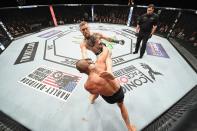 <p>Eddie Alvarez of the United States (bottom) fights against Conor McGregor of Ireland in their lightweight championship bout during the UFC 205 event at Madison Square Garden on November 12, 2016 in New York City. (Photo by Jeff Bottari/Zuffa LLC/Zuffa LLC via Getty Images) </p>