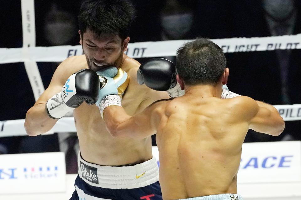 Gennadiy Golovkin of Kazakhstan sends to left to Ryota Murata of Japan during their WBA/IBF middleweight unification boxing title match in Saitama, near Tokyo, Saturday, April 9, 2022. (AP Photo/Shuji Kajiyama)